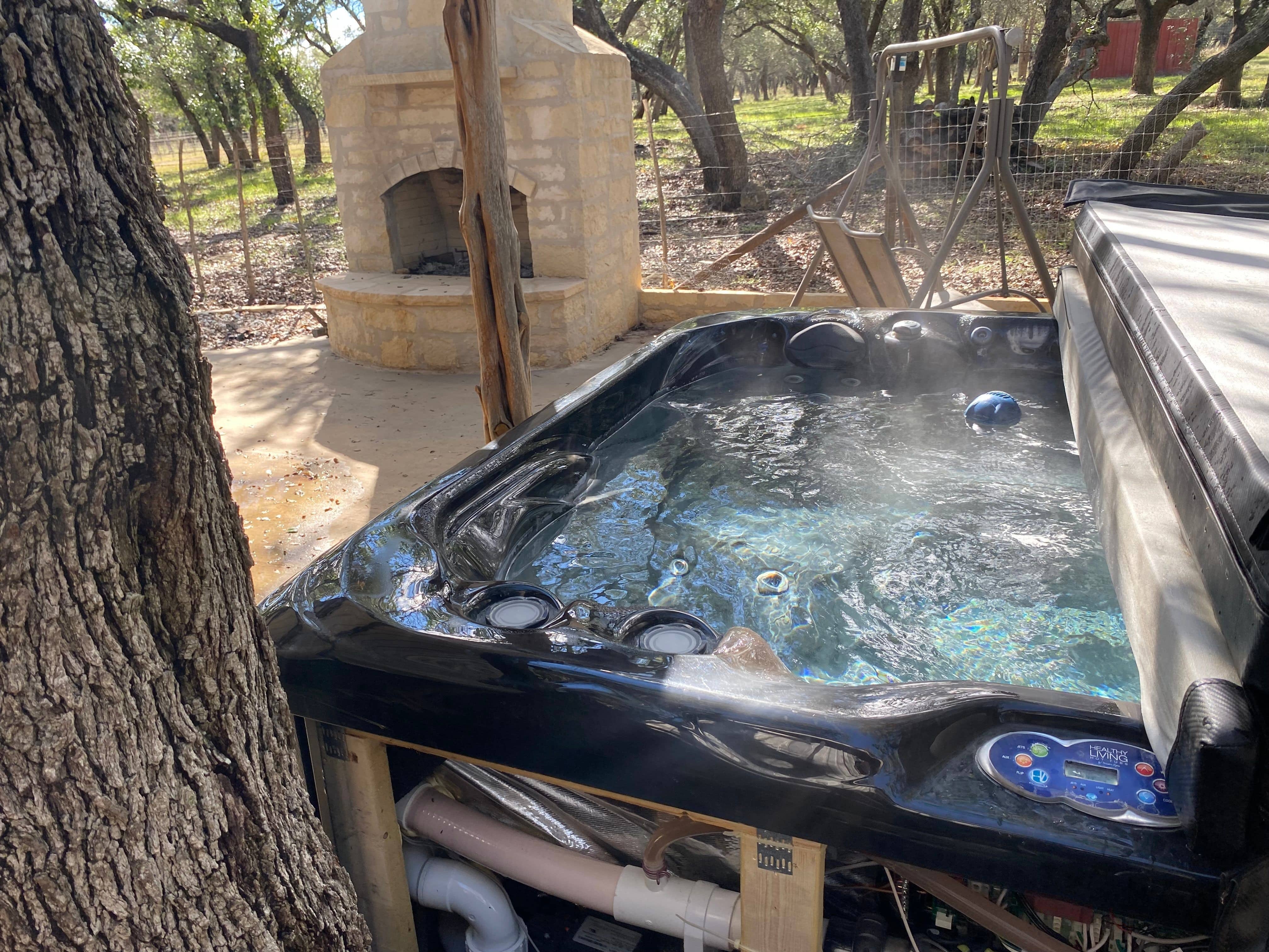 A hot tub panel is open during repairs